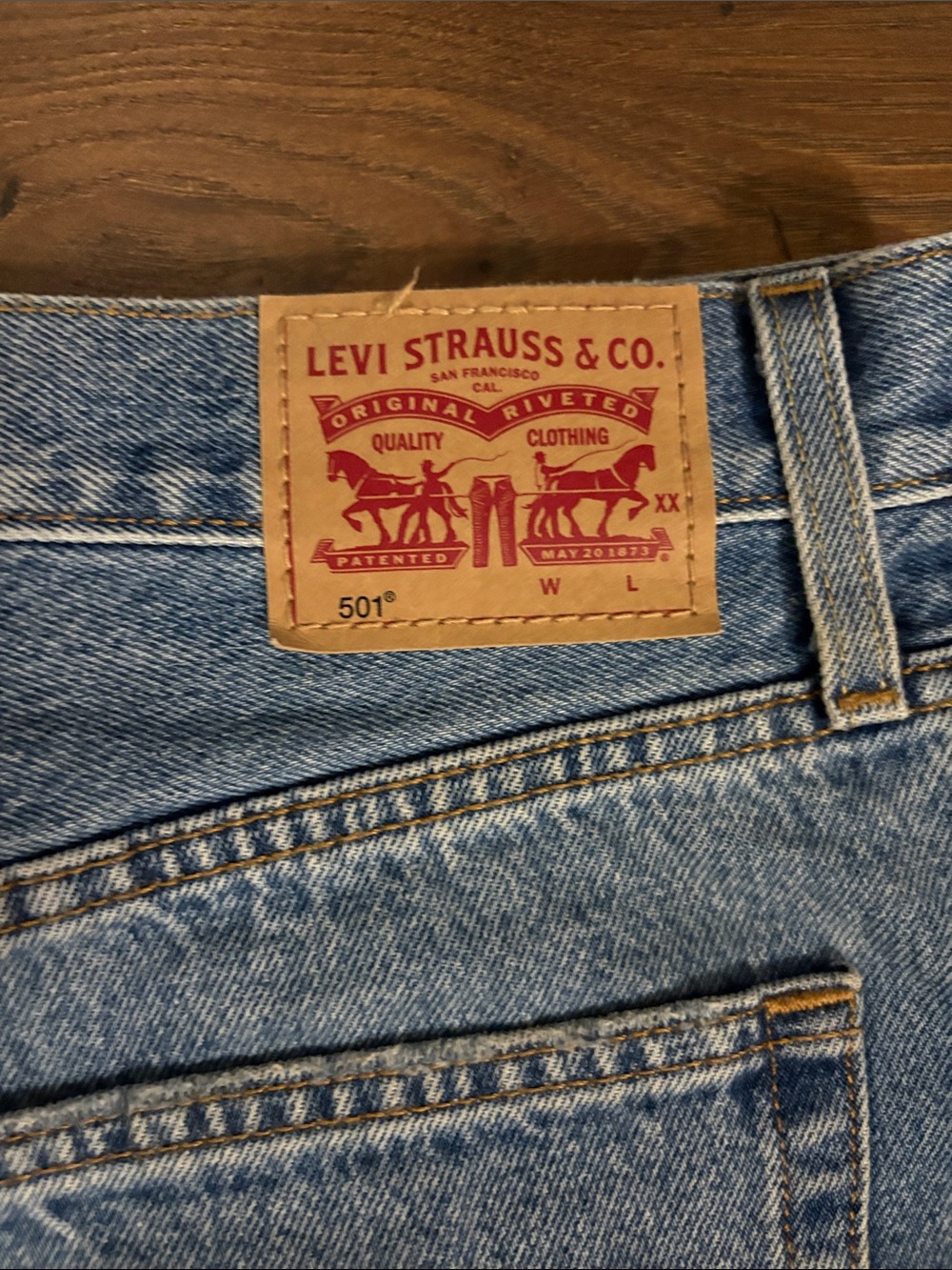 Levi's Medium Blue Distressed Denim Cutoff Shorts - Picture 3 of 5
